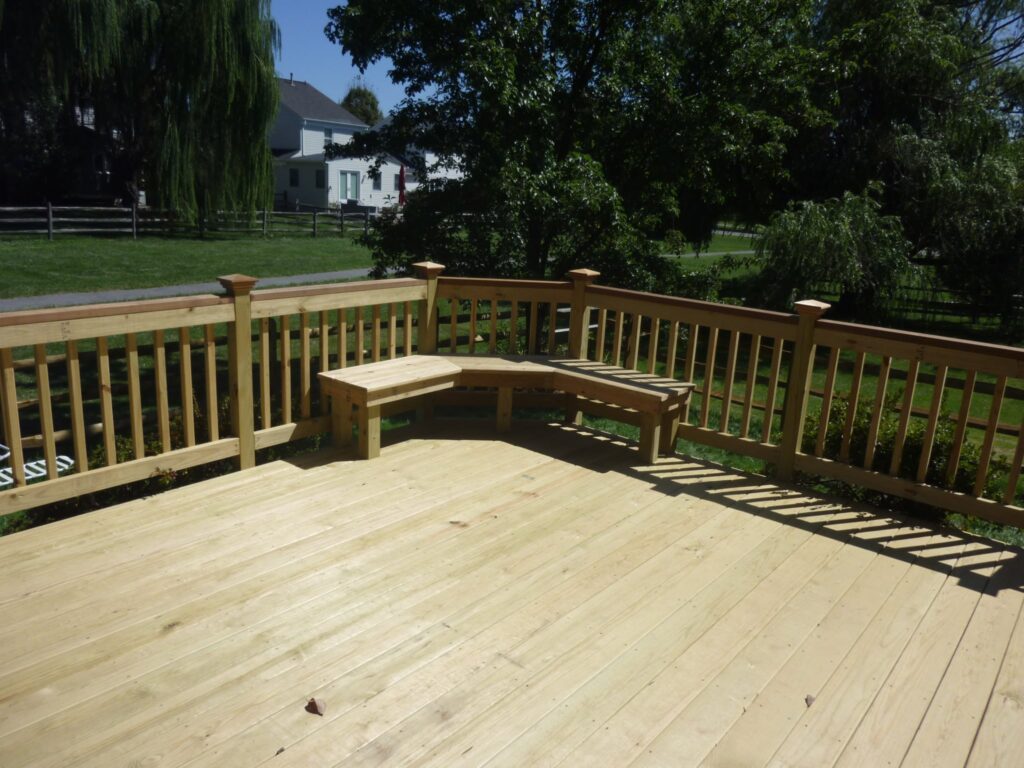 a wooden deck with a bench on it montgomery county md