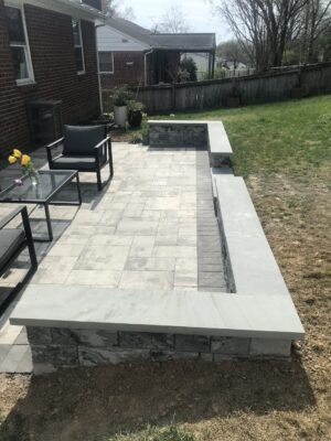 Patio with raised walls and entertaining area