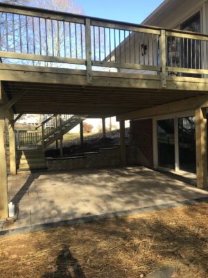 new wooden deck built over new layed patio