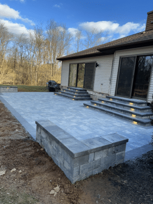 beautiful patio installation with lit stairs
